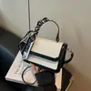 Lujo ligero y sensación de alta gama, moda elegante de verano 2026, bolso de hombro cruzado simple y versátil con cinta
