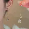 Pendientes de diseño oscilantes con borlas y estrellas, pendientes largos nuevos, temperamento súper etéreo, alta gama, sin agujero en la oreja, pendientes para hermanas