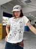 Camiseta Manga Curta Pesada de Ombro Normal com Estampa de Desenho Animado Americano Feminina Verão 2026 Novo Design Sense Nicho Gola Redonda