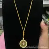 Colgante de Brújula de Ocho Tesoros Giratoria Incrustada de Diamantes, Collar de Brújula Hueca con un Diseño Único, un Artículo Popular de Joyería Transfronteriza