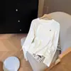 Camiseta blanca de algodón base holgada y adelgazante para mujer talla grande, nueva camiseta de manga larga para otoño 2026
