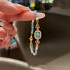 Nuevo brazalete de estilo chino vintage imitación turquesa esmeralda, exquisita joyería de lujo ligero estilo palacio, cadena para la clavícula, juego de accesorios de estilo chino tradicional