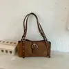 Coleção de outono 2026 feminina minimalista e estilosa transfronteiriça: uma bolsa de ombro chique e única com um design casual e elegante, perfeita para carregar sob o braço