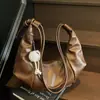 Bolso de Mujer de Gama Alta con Forma de Cuerno 2026 Nuevo Vintage Gran Capacidad Bolso Cruzado de Nicho Bolso Tote de Nicho para el Trabajo