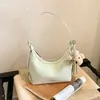 Bolso de mujer de alta calidad transfronterizo, nuevo modelo primavera 2026, diseño de nicho, bolso de hombro simple para llevar debajo del brazo, bolso tipo empanada