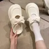Pantuflas cerradas de suela gruesa para mujer para usar en exteriores, nuevo modelo 2026, sandalias dulces perforadas para mujer, sandalias de playa de alta gama para mujer