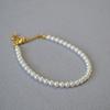 Pulsera apilable de mujer elegante y simple, estilo francés de nicho, perla de imitación de cristal, cálida y suave, de alta gama
