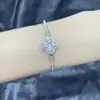 Anillo Cruzado de Plata de Ley S925 con Moissanita de Trébol de Cuatro Hojas para Mujer Clásico Versátil Lujo Accesible Europeo y Americano Anillo de Gama Alta