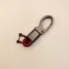 Llavero de coche de alta gama puede ser radiación láser llavero para hombre de negocios anti-pérdida hebilla de llave pequeños regalos al por mayor
