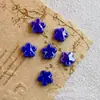 Cuentas de cerámica de flor de cinco pétalos, cuentas sueltas de cerámica de flor de ciruelo, cuentas de flor ensartadas, accesorios DIY hechos a mano en Yiwu, collar, pulsera