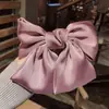 Clip de resorte con lazo de perla, accesorio para el cabello de alta gama, elegante y francés para celebridades de Internet.