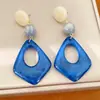 Pendientes redondos con forma de diamante de resina con aguja plateada, estilo europeo y americano, elegantes y únicos, pendientes exagerados, sensación de lujo ligero y alta gama, al por mayor