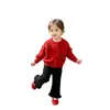 Conjunto de estilo coreano para niña 2026 nuevo modelo cárdigan de punto de cereza infantil y pantalones casuales de lana conjunto de dos piezas para primavera y otoño