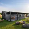 Casas móviles de contenedores expandibles de doble ala hechas a medida, villas prefabricadas y casas modulares de panel de contenedores para comercio exterior