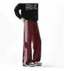 Pantalones casuales a rayas de bloques de color de secado rápido estilo americano para hombre, tendencia de verano hiphop holgados de pierna ancha rectos deportivos