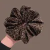 Scrunchie retrô com estampa de leopardo estilo coreano para mulheres, novo modelo outono/inverno 2026, acessório de elástico para coque de alta qualidade