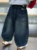 Pantalones para niño colección otoño 2026 nuevo estilo niños otoño estilo coreano jeans holgados bebé primavera y otoño pantalones linterna modernos