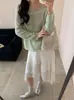 Suéter pullover de punto de alta gama estilo coreano con cuello redondo, nuevo modelo otoño e invierno 2026, corte holgado, adelgazante, top de punto ligero para mujer