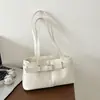 Bolso cuadrado pequeño fresco y dulce al por mayor para mujer, nuevo modelo de verano 2026, bandolera texturizada de color liso, bolso de axila para el trabajo