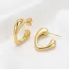 Pendientes de Corazón Dorados Estilo Europeo y Americano para Mujer, Diseño de Nicho de Lujo Ligero, Clavos en Forma de Corazón, Pendientes Versátiles Elegantes de Gama Alta