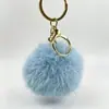 Lindo Nutria Conejo Piel Pompón Pequeño Llavero Colgante Ins Celebridad de Internet Peluche Bola Pequeña de Carbón Colgante para Mochila Bolso Adorno Regalo
