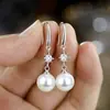 Brincos de Pérola Elegantes Simples Estilo Chinês Personalizado Elegante Leve Luxo Temperamento Joia de Orelha Moda Versátil High-End Gancho de Orelha
