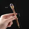 Pluma de Piedra Cruda de Cristal Natural Bolígrafo Madera Maciza Pluma Mágica Estilo Retro Creativo Bastón de Cristal Pluma Mágica Europea y Americana
