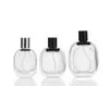 Botella de Perfume de Vidrio Plano Ovalada Transparente con Atomizador Negra Tapa de Aluminio Anodizado Botella de Recarga de Perfume
