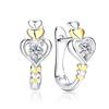 Pendientes coreanos creativos con forma de corazón, flor de corazón y pelo enfadado, dorados, con separación de color, accesorios para las orejas.