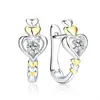 Pendientes coreanos creativos con forma de corazón, flor de corazón y pelo enfadado, dorados, con separación de color, accesorios para las orejas.