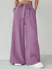 Pantalones de pierna ancha para mujer de comercio exterior transfronterizo en stock, pantalones largos holgados de moda, pantalones drapeados versátiles casuales de color brillante para mujer de primavera y verano