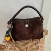 Bolso de mujer retro esmerilado de moda 2026 nuevo bolso cruzado versátil de moda para el trabajo bolso de mano otoño e invierno bolso cuadrado pequeño