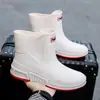 Botas de lluvia para hombres y mujeres, zapatos impermeables para cocina y obras de construcción, botas cortas de goma cálidas de algodón polar engrosado para exteriores, venta al por mayor de botas de lluvia