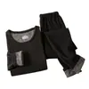 Ropa interior térmica de invierno para hombre, traje de cuello redondo de cachemira y seda, nuevo para mujer, engrosado, amigable con la piel, calentamiento rápido, ropa de otoño y pantalones