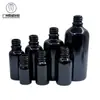 En stock venta al por mayor 5ml-100ml botella negra para aceites esenciales botella de vidrio con gotero botella de esencia botella de vidrio para subempaque de cosméticos