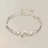 Pulsera con lazo de flor de cerezo y circonita rosa para mujer, estilo moderno y elegante, de lujo, de alta gama, ideal para novias.