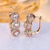 Popular Europeu e Americano Ouro Champagne e Diamante Branco Três Rodadas Cheias de Diamante Exquisite Cobre Banhado a Ouro Real Versátil Elegante Brincos Atacado