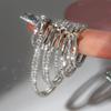 Conjunto de varias piezas de pendientes y anillo de aleación de diamantes para mujer, estilo europeo y americano, de moda transfronteriza, adecuado para fiestas de viajeros.