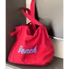 Bolsa de ombro de nylon impressa em nova letra estilo coreano feminina casual versátil com cordão de grande capacidade