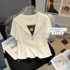 Camiseta Chic de Talla Grande de Dos Piezas Falsas de Manga Corta para Mujer Verano 2025 Nueva Apariencia Holgada Adelgazante Reductora de Edad Top Versátil de Moda