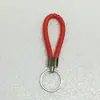 Novo chaveiro de corda de couro tecido mochila criativa pingente chaveiro para empurrar pequeno presente chaveiro de carro atacado
