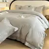 Juego de cuatro piezas para dormitorio de algodón sateen 100% algodón de fibra larga de alta gama clase A bordado estilo lujo ligero algodón puro ropa de cama para todas las estaciones