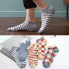 Calcetines Zhuji al por mayor Primavera y Otoño Todas las estaciones Hombres y Mujeres Mismo estilo Pareja Nuevos Calcetines Deportivos Casuales para Correr Calcetines para Hombre