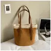 Bolso de hombro popular para mujer, bolso tipo cubo, bolso de terciopelo, nuevo bolso cruzado de alta gama de moda, bolso de mano al por mayor