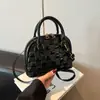 Bolsa de Textura de Moda de Comercio Exterior para Mujer 2026 Nueva con Relieve de Cuadros Tipo Concha Versátil de Hombro Único para Debajo del Brazo Bolso de Mano para Dama