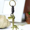 Llavero creativo para hombre y mujer, regalo pequeño, aleación, jirafa linda, llavero de cuero tejido vintage, llavero
