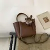 Bolsa Saco Versátil e Estilosa com Acabamento de Luxo, Design de Nicho para o Trajeto para o Escritório 2026, Bolsa de Ombro e Transversal Estilo Coreano