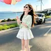 Conjunto Dulce y Fresco 2026 Verano Nuevo Estilo Coreano Chal Camiseta de Manga Corta Lindo Moño Falda Corta Conjunto de Dos Piezas
