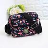 Bolsa de pano de flores Nova bolsa crossbody feminina Pano Oxford Bolsa de mãe de meia-idade e idosa Bolsa Bolsa de ombro multicamadas Bolsa de lona