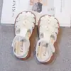 Sandálias Romanas Mágicas Vazadas para Crianças 2026 Verão Novo Estilo Coreano Meninas Laço Bico Aberto Sapatos de Princesa